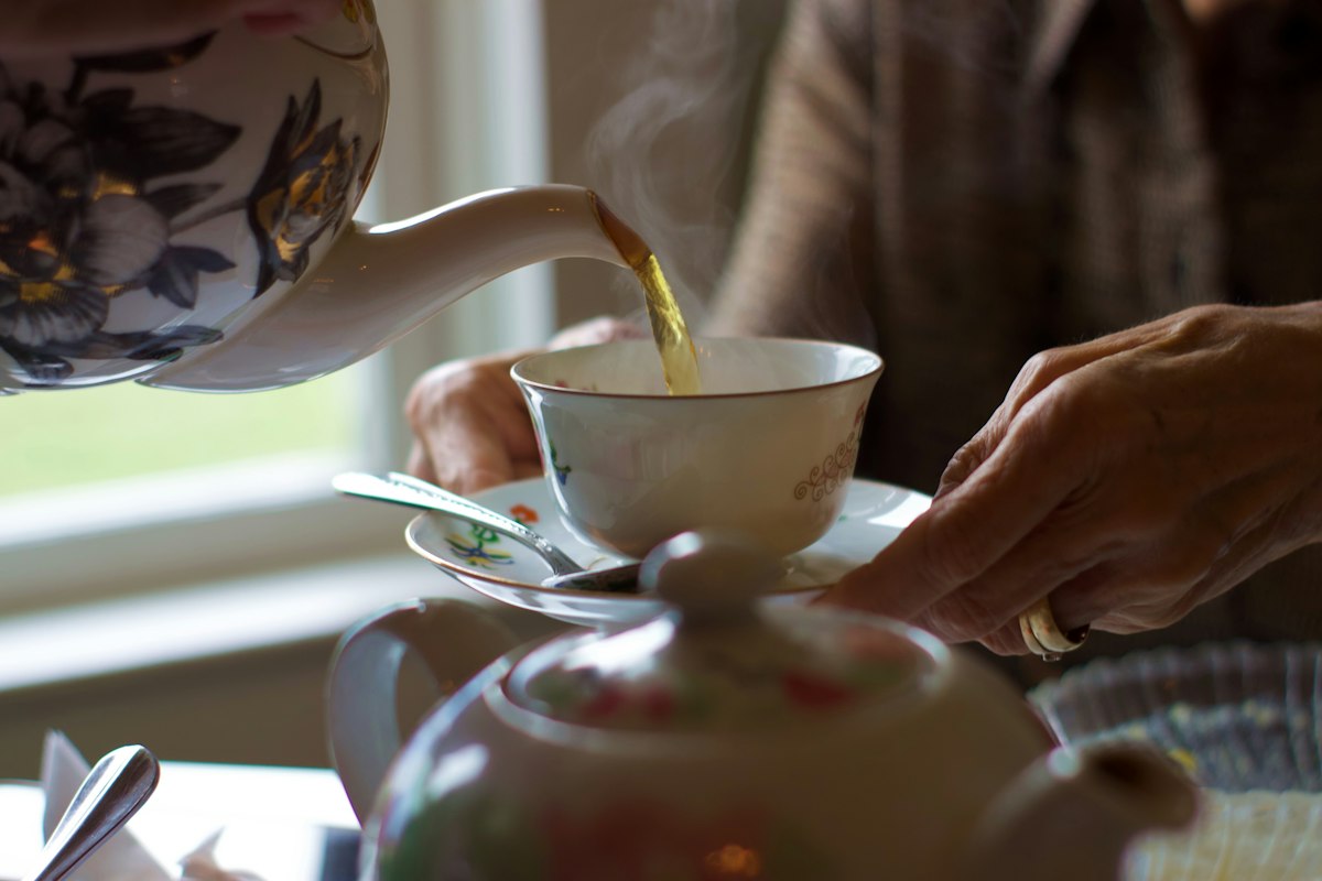 Aged pu-erh tea cakes and brewed tea